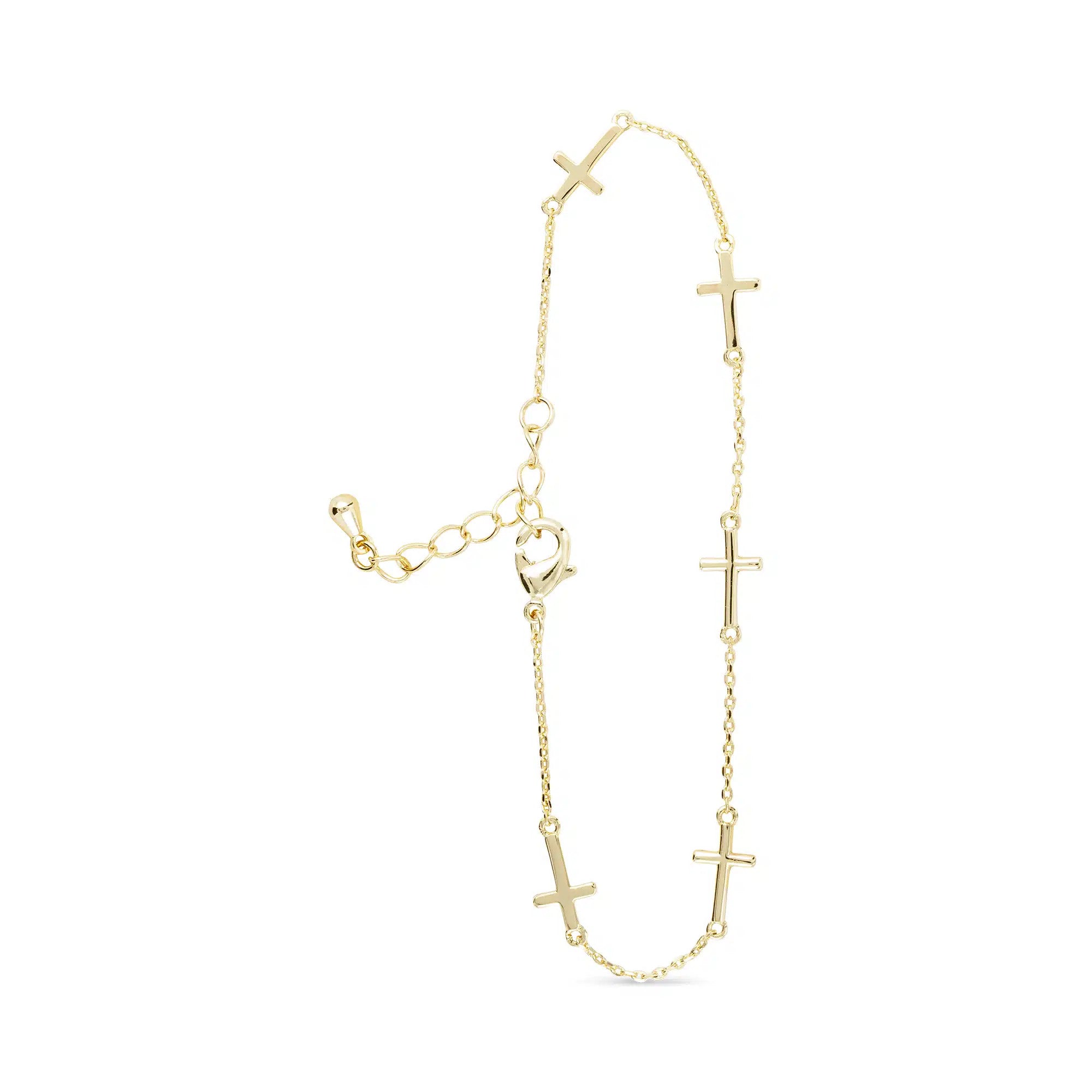 Gold station bracelet with five small cross charms on a fine chain with an adjustable clasp.