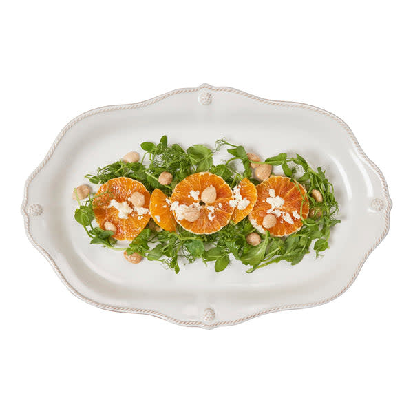 Whitewash ceramic platter with scalloped edge, berry pattern rim and simple thread detail.