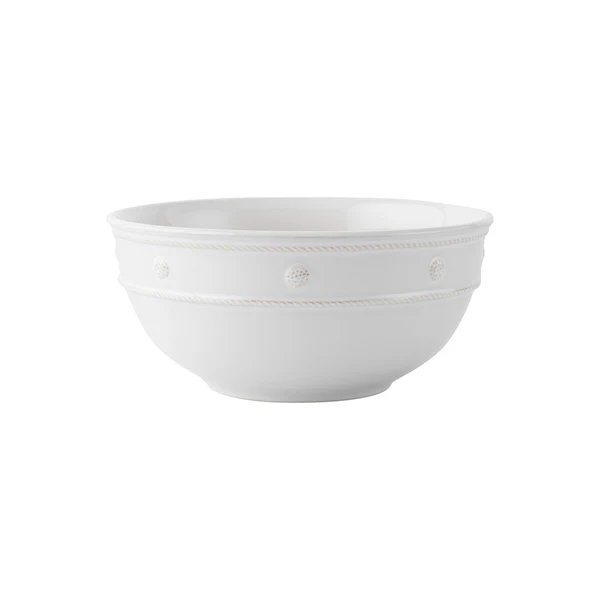 Whitewash ceramic nesting serving bowl with a natural wood grain pattern.
