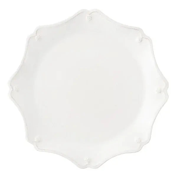 Whitewash ceramic scalloped charger plate with a classic round silhouette.