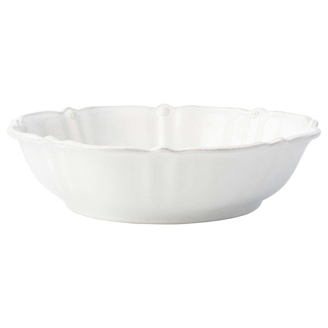 Whitewash ceramic serving bowl with subtly ruffled rim edges