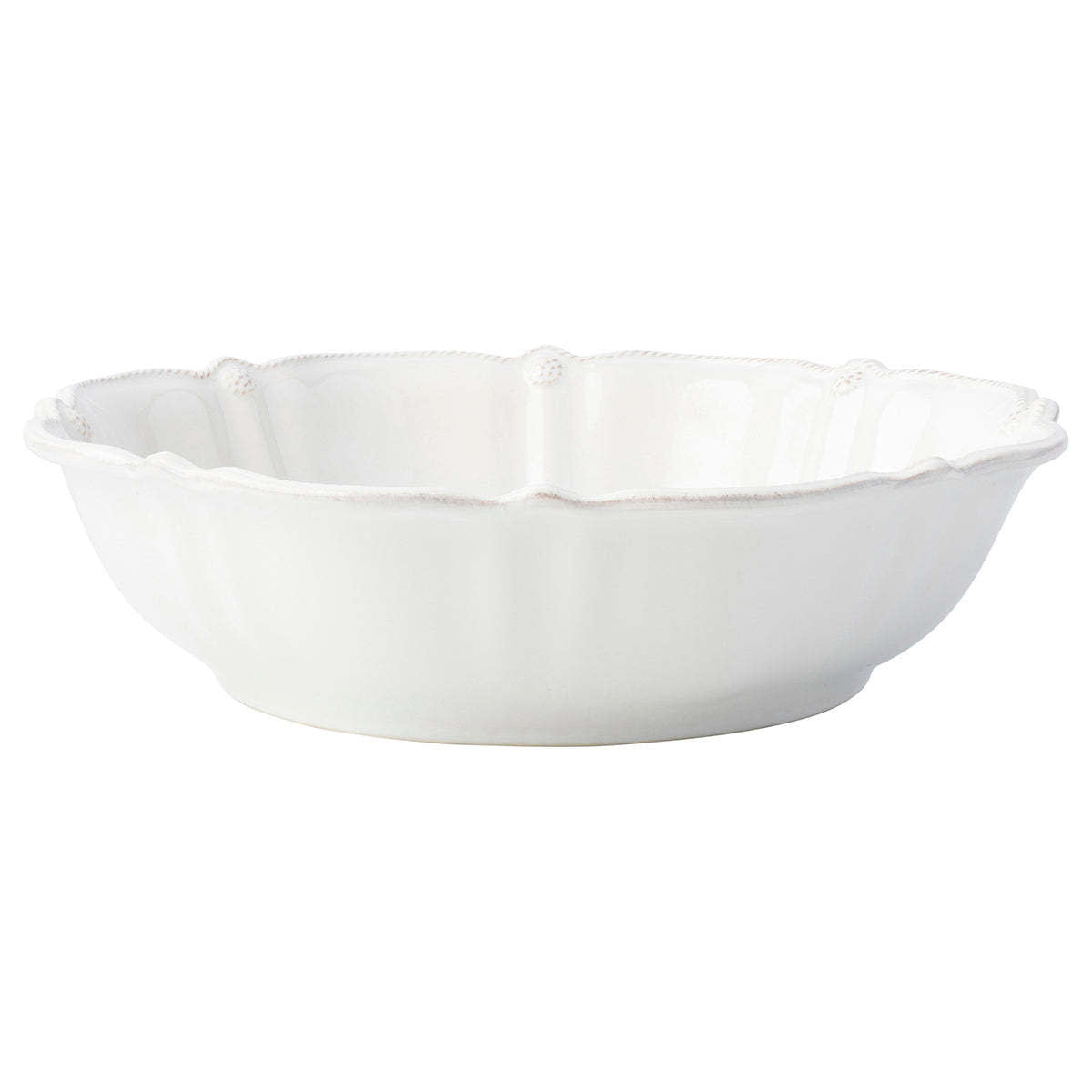 Whitewash ceramic serving bowl with subtly ruffled rim edges