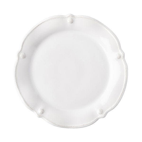 White ceramic scalloped dessert plate with berry speckle pattern