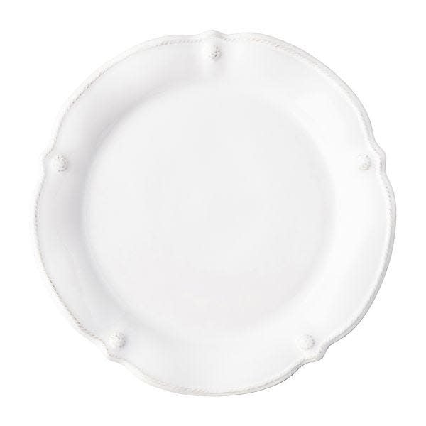White ceramic flared dinner plate with a fluted rim