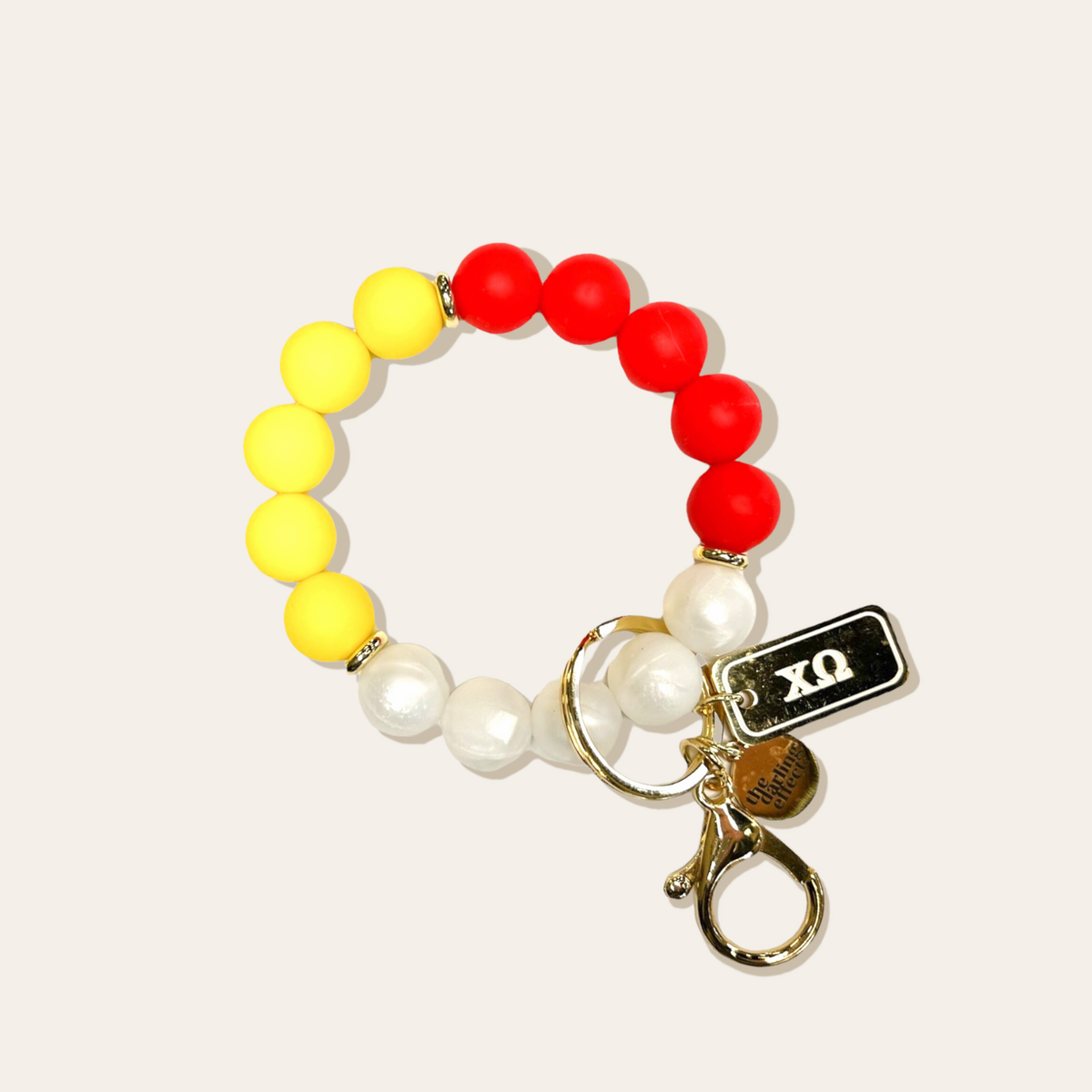 Black sorority hands-free wristlet with a detachable keychain loop.