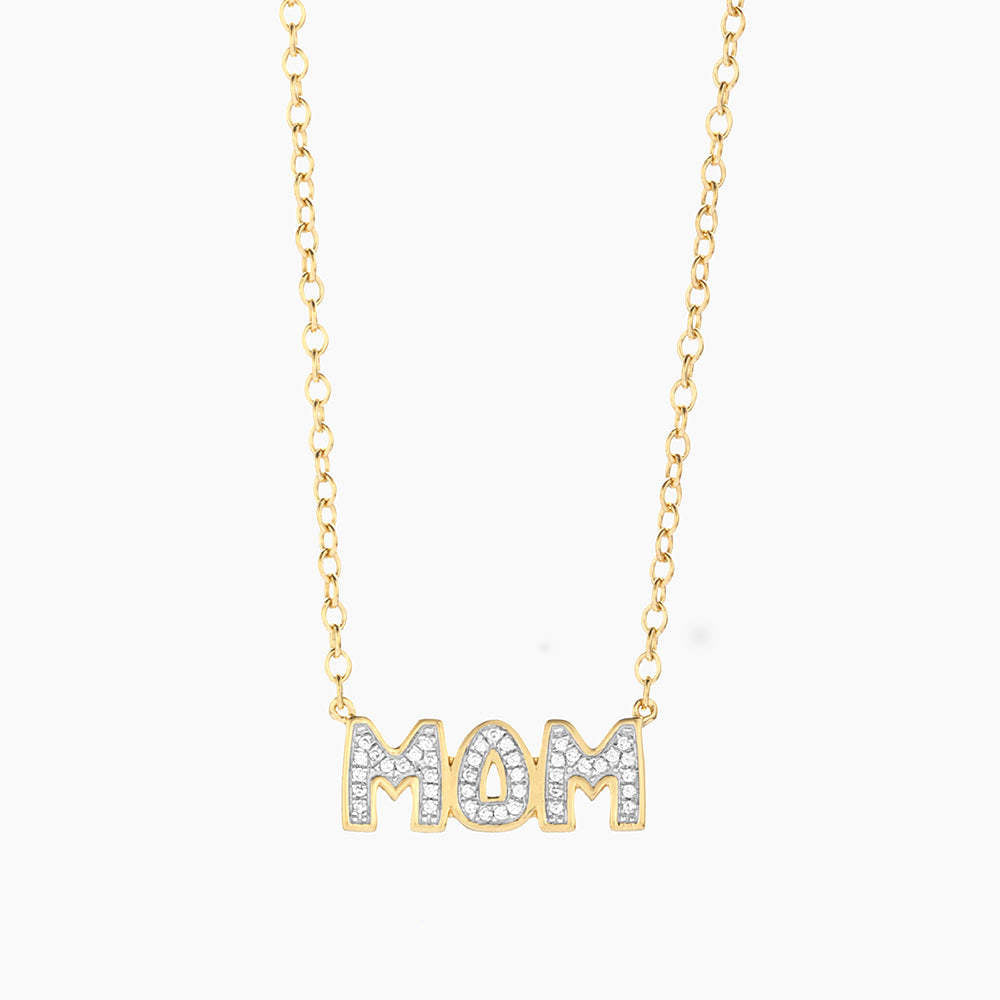 Silver pendant necklace featuring a heart-shaped charm engraved with 'Best Mom In The World' on an 18-inch chain.