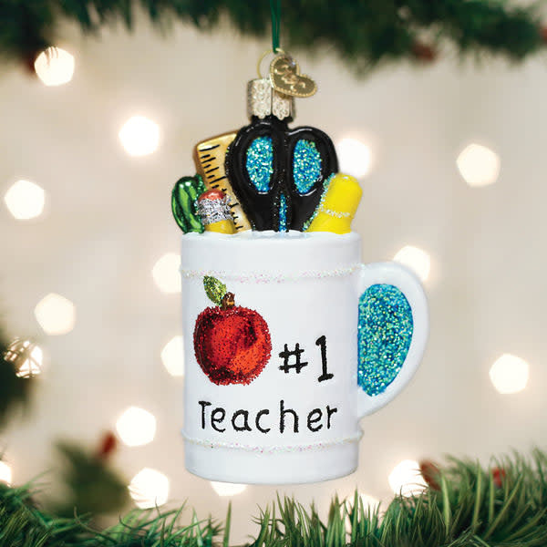 Red ceramic mug ornament with white text reading Best Teacher Mug Ornament.