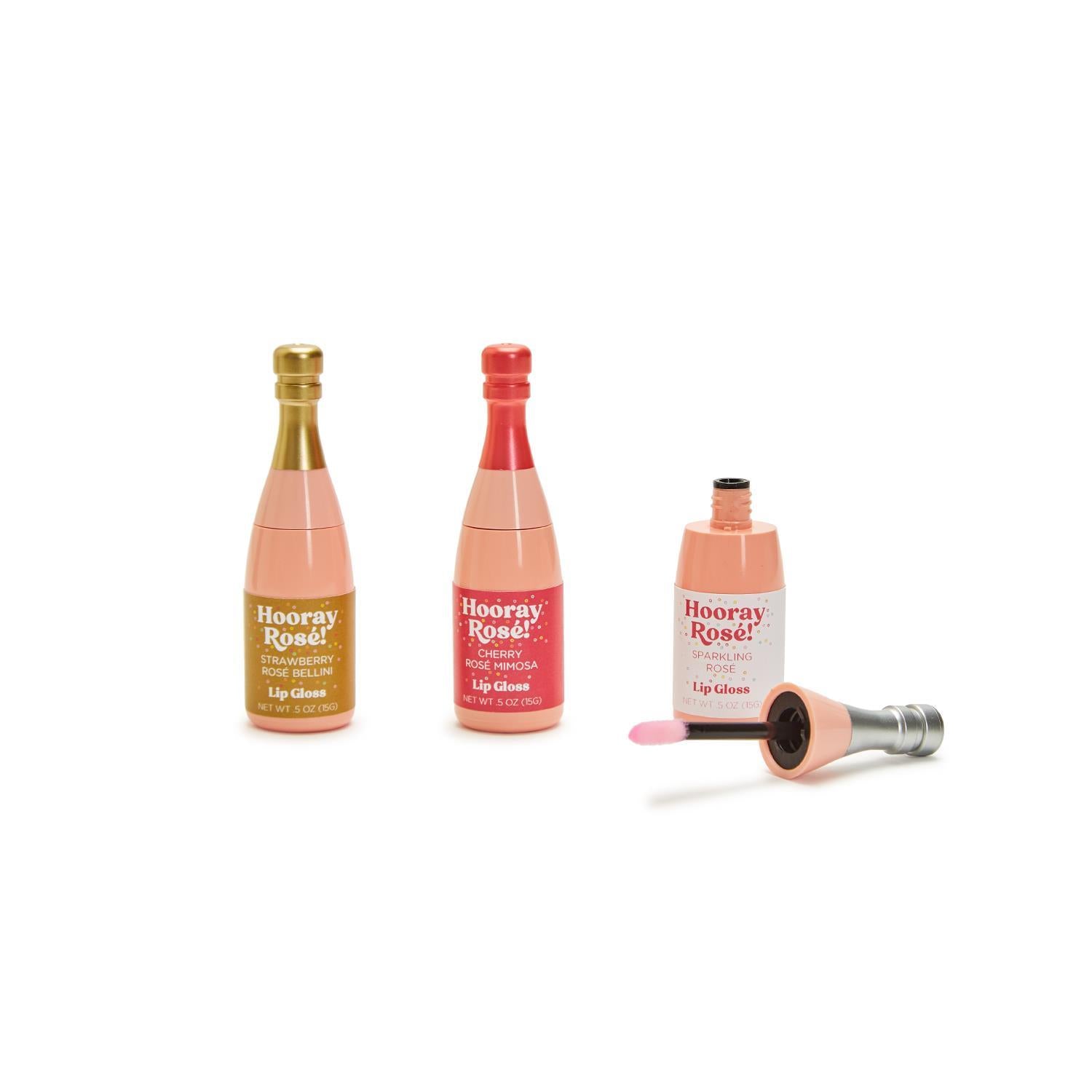 Champagne Bottle Lip Gloss in a clear cylindrical container with tapered applicator
