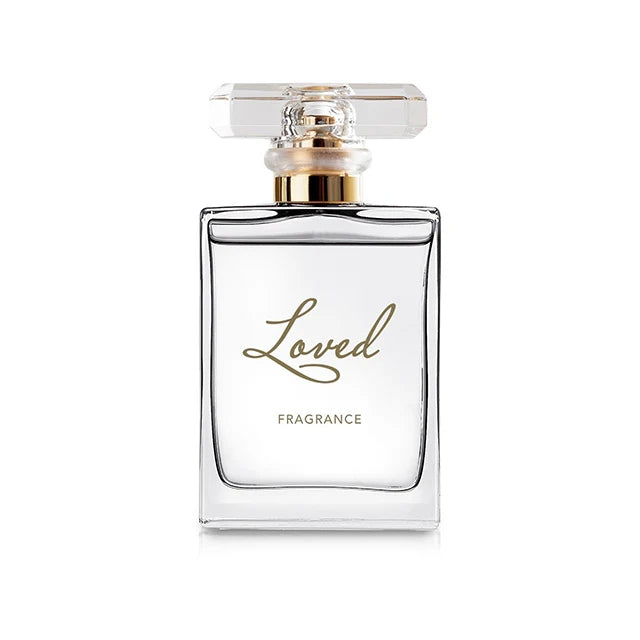 Loved Fragrance in a clear glass bottle with silver cap