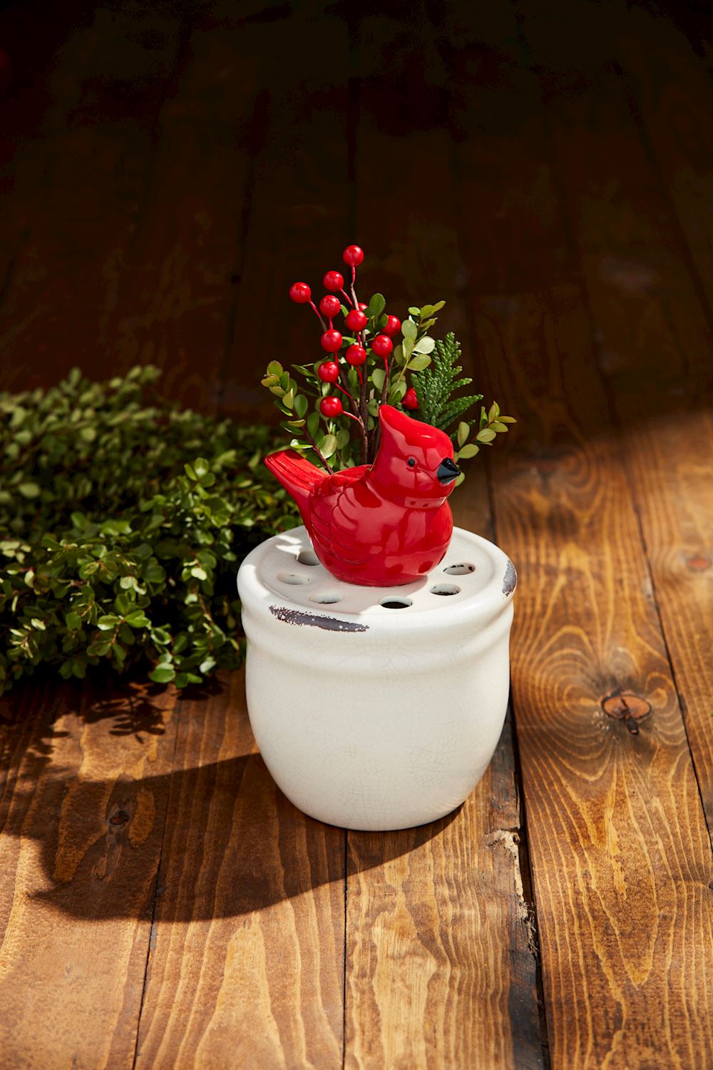 Cardinal Stem Vase in deep red ceramic with a slender cylindrical shape.