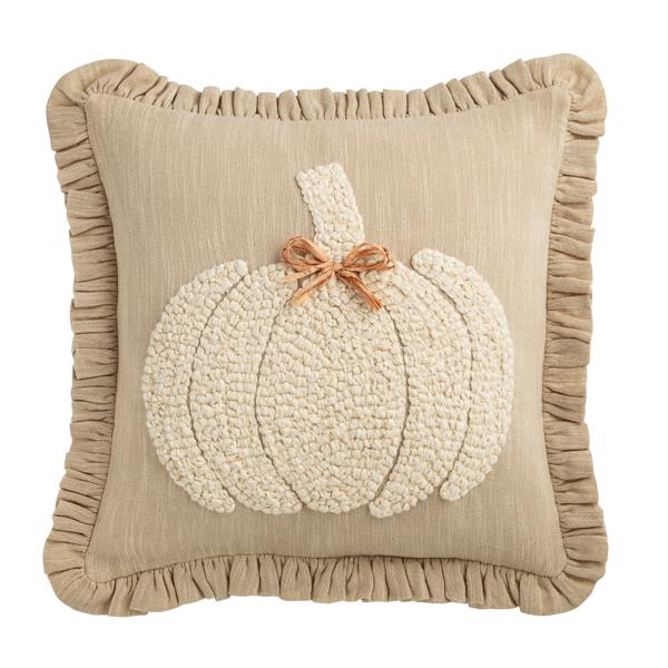 White chambray square pillow with embroidered pumpkin yarn detail and raffia bow accent.