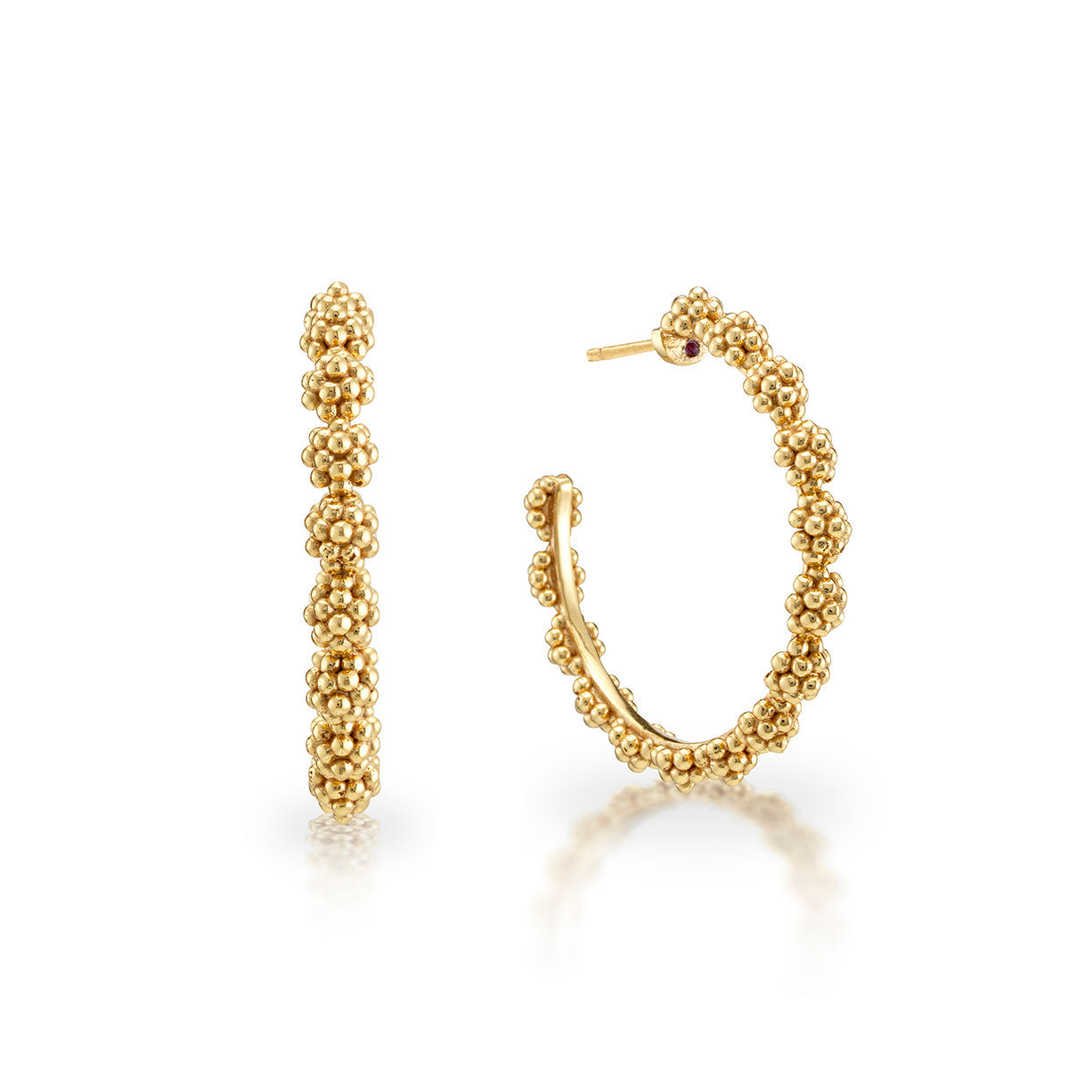 Gold hoop earrings with a berry icon charm featuring an artisan-made finish.