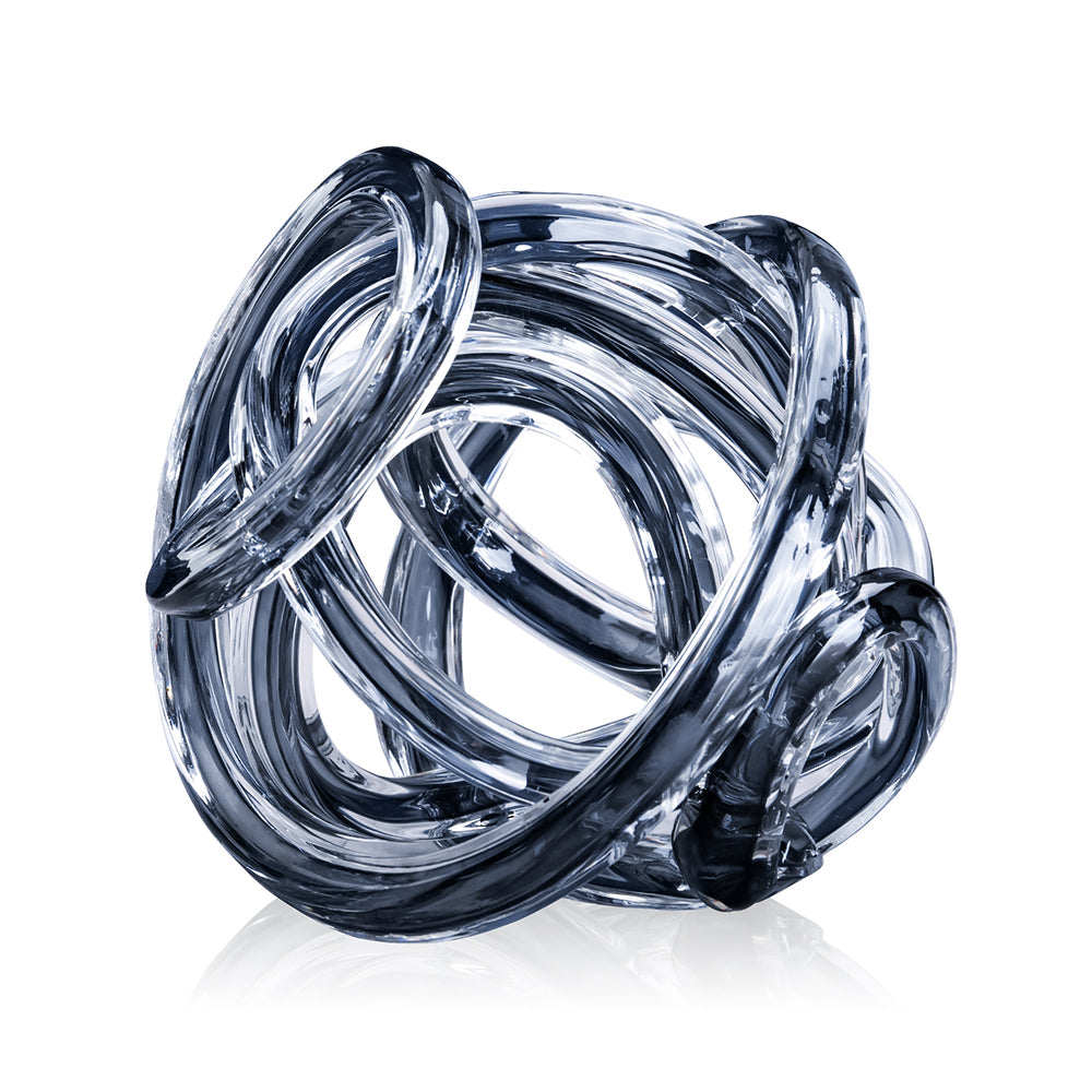 7-inch square glass knot sculpture in clear transparent finish with smooth geometric edges.