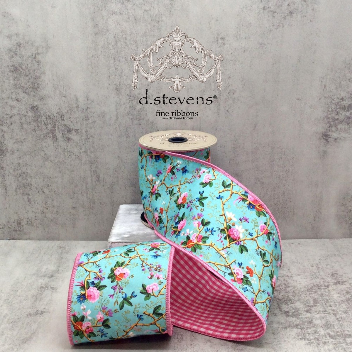 Light blue poplin ribbon with pink floral branch print.