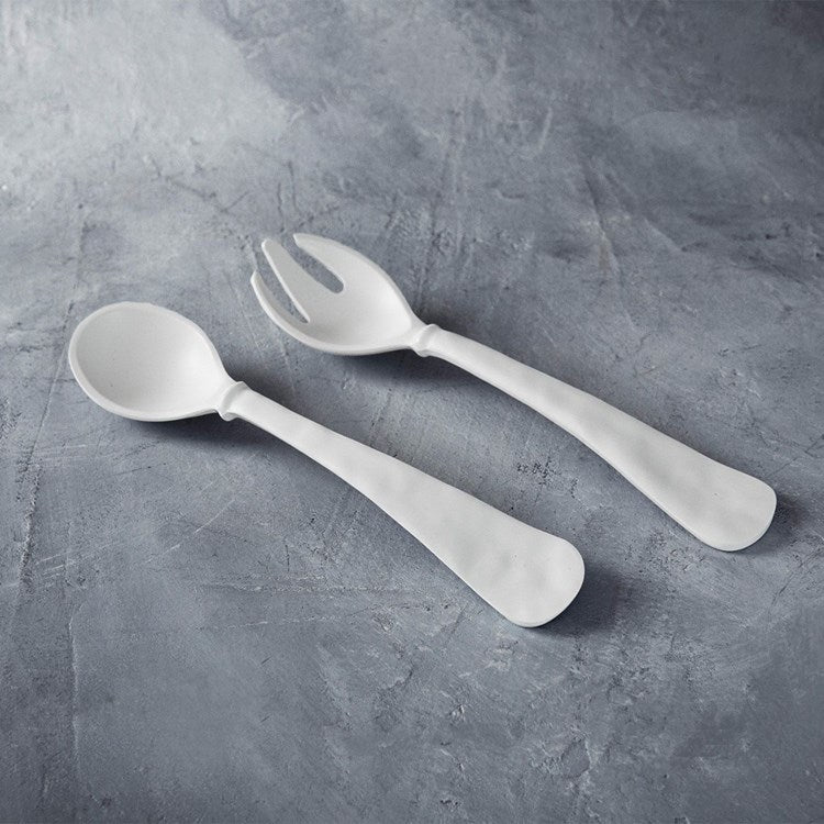 Large salad servers made from heavy-weight black melamine with a smooth finish.
