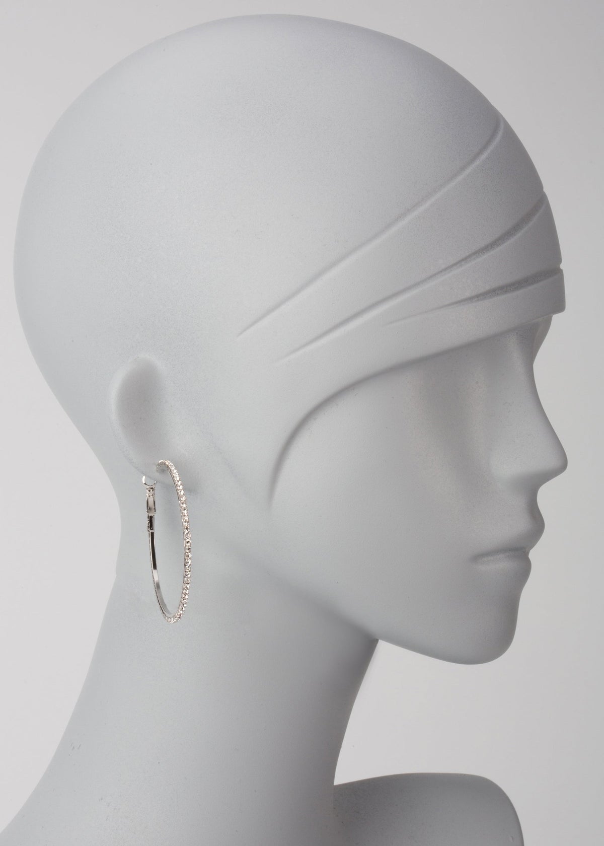 Silver-tone CZ hoop earring with French post closure