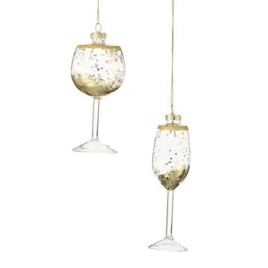 Glass wine and champagne flute Christmas ornaments with gold glitter accents, sold individually.