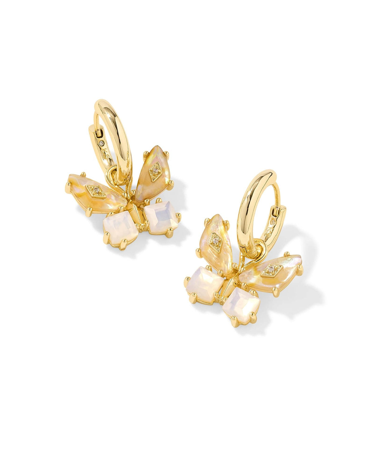 Gold huggie earrings with removable iridescent butterfly charms featuring color-coordinated stones and sparkling accents.