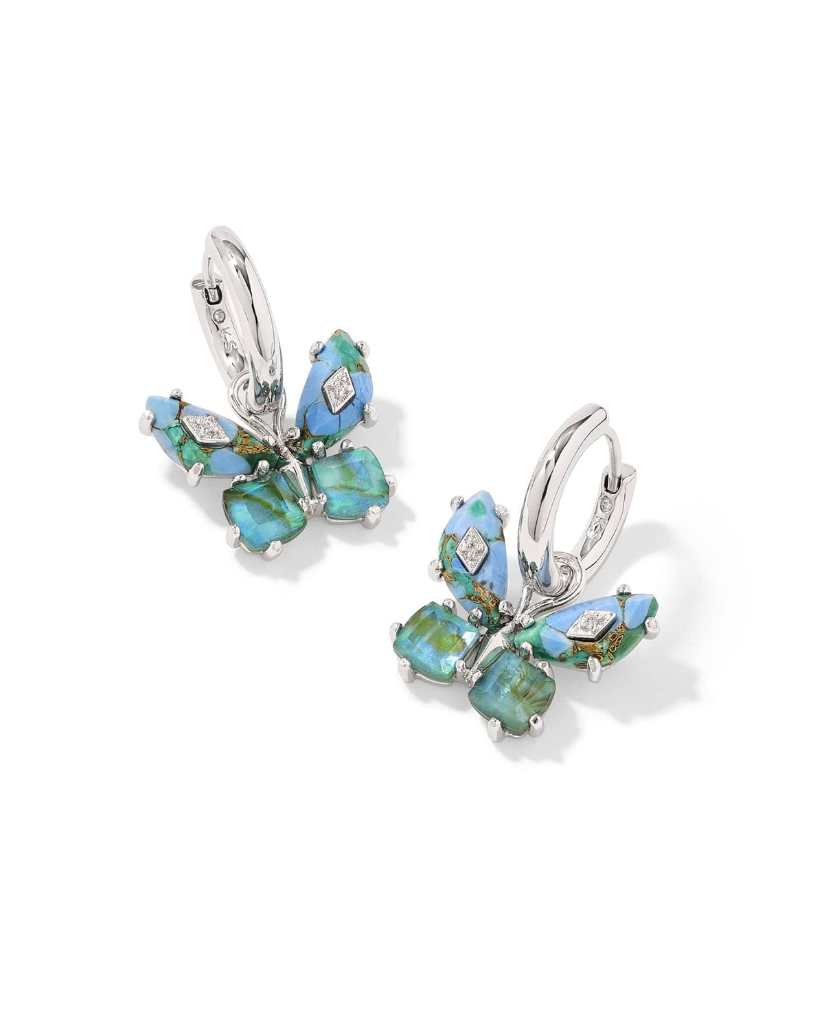 Silver huggie earrings with removable butterfly charms featuring bright aqua stones.