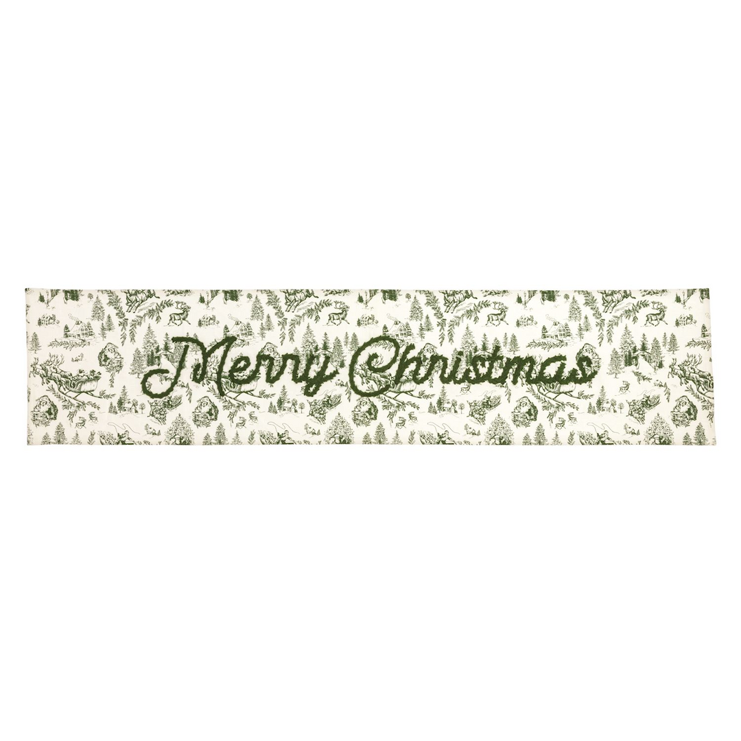 Green Toile Table Runner with embroidered Merry Christmas text and festive winter scene pattern.