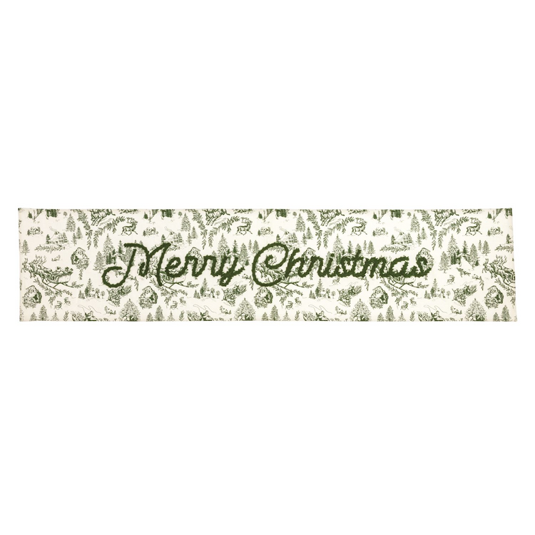 Green Toile Table Runner with embroidered Merry Christmas text and festive winter scene pattern.