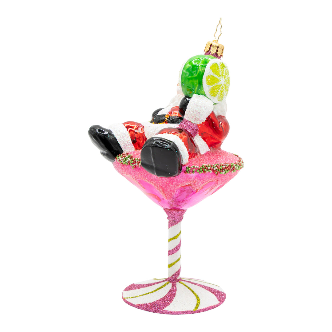 Santa's Christmas Cosmo glass ornament featuring Santa relaxing in a pink martini glass.