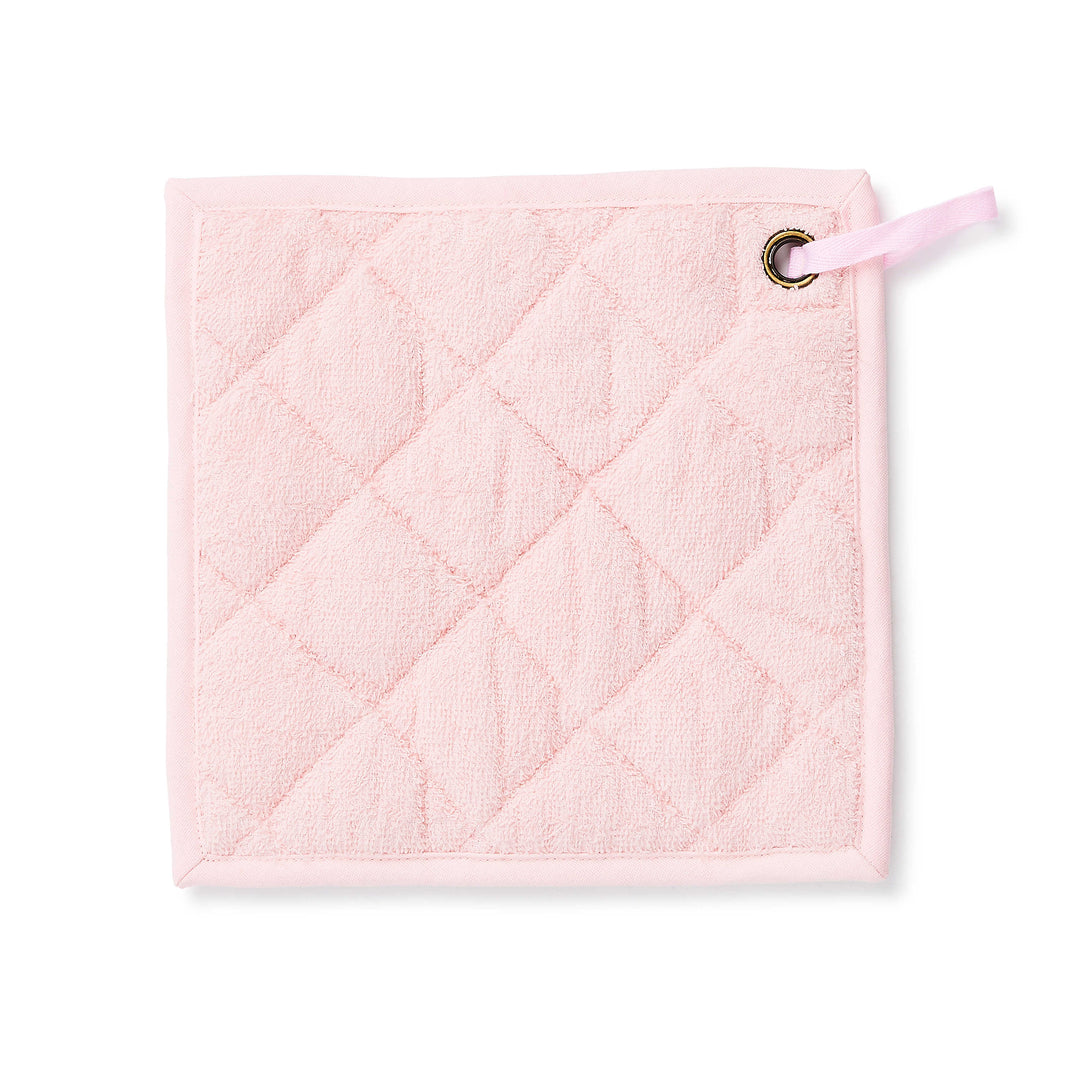 Square light pink quilted cotton potholder with a metal grommet and hanging loop.