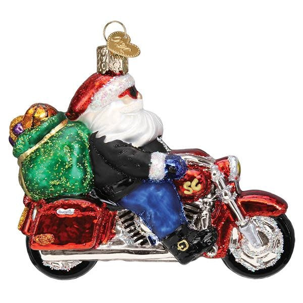 Biker Santa ornament with motorcycle silhouette in red and black holding a gift bag.