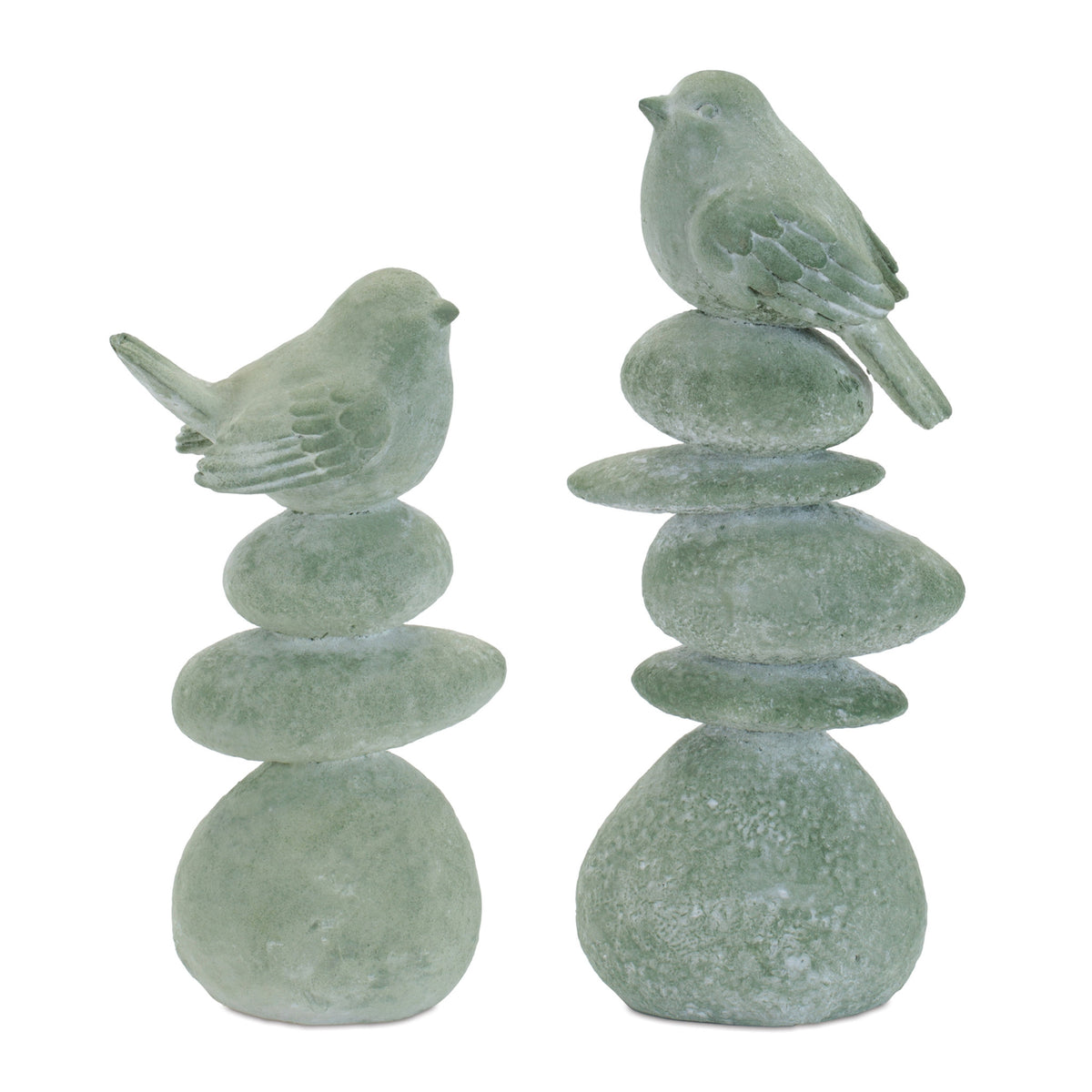 Resin figurine of a bird perched on smooth rocks with serene natural design.