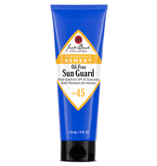 Bottle of Oil-Free Sun Guard SPF 45 sunscreen with white cap against neutral background.