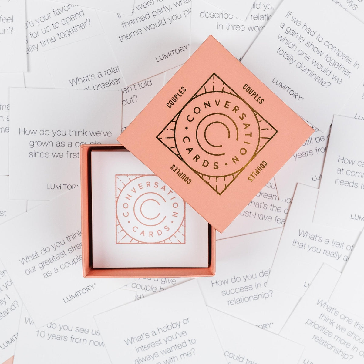 A box of Couples Conversation Cards featuring a colorful geometric pattern on the cover.