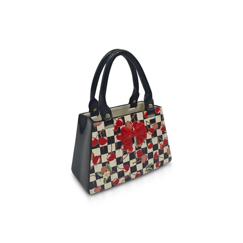Mon Cheri Handbag Vase featuring a black and white checkered pattern with red cherry designs.