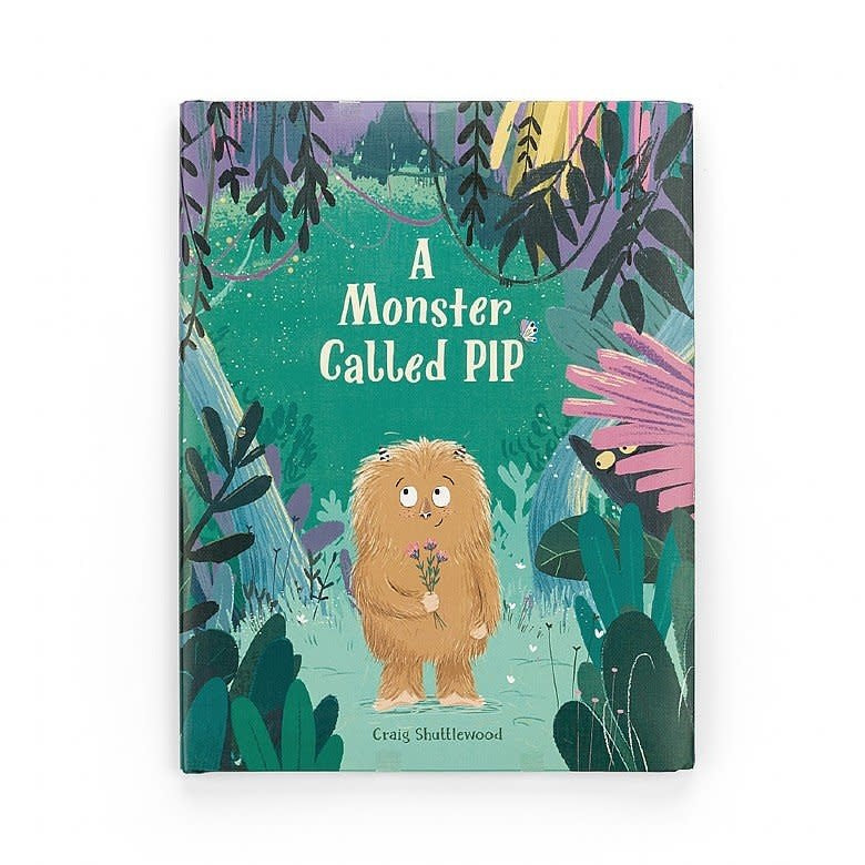 Hardcover children's book titled A Monster Called Pip featuring a cute green monster character on the cover.