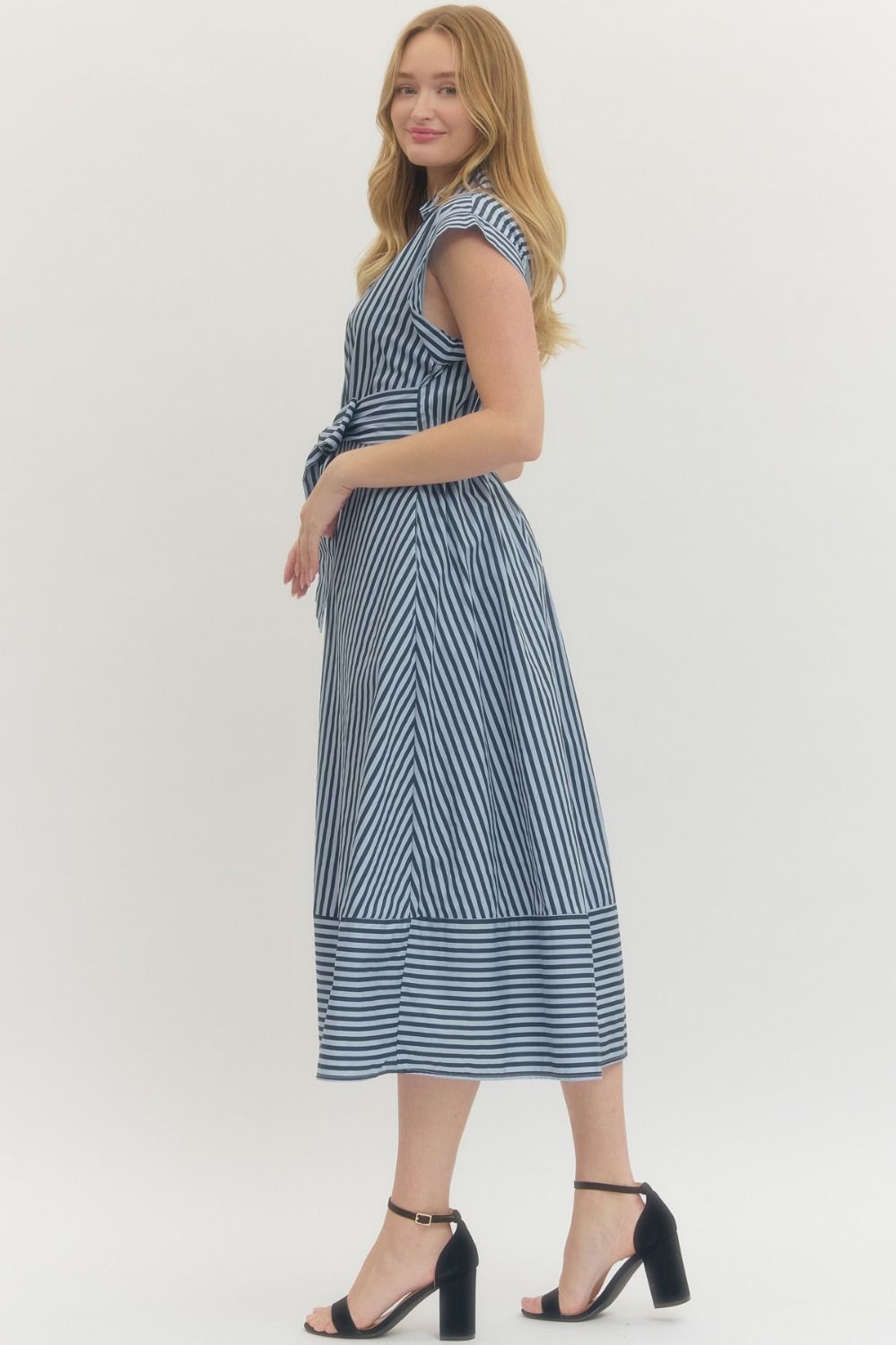 Donna striped cotton midi dress with cap sleeves, side pockets, and a lined woven silhouette in neutral tones.