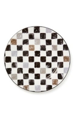 Black checkered round stoneware platter with a matte finish.