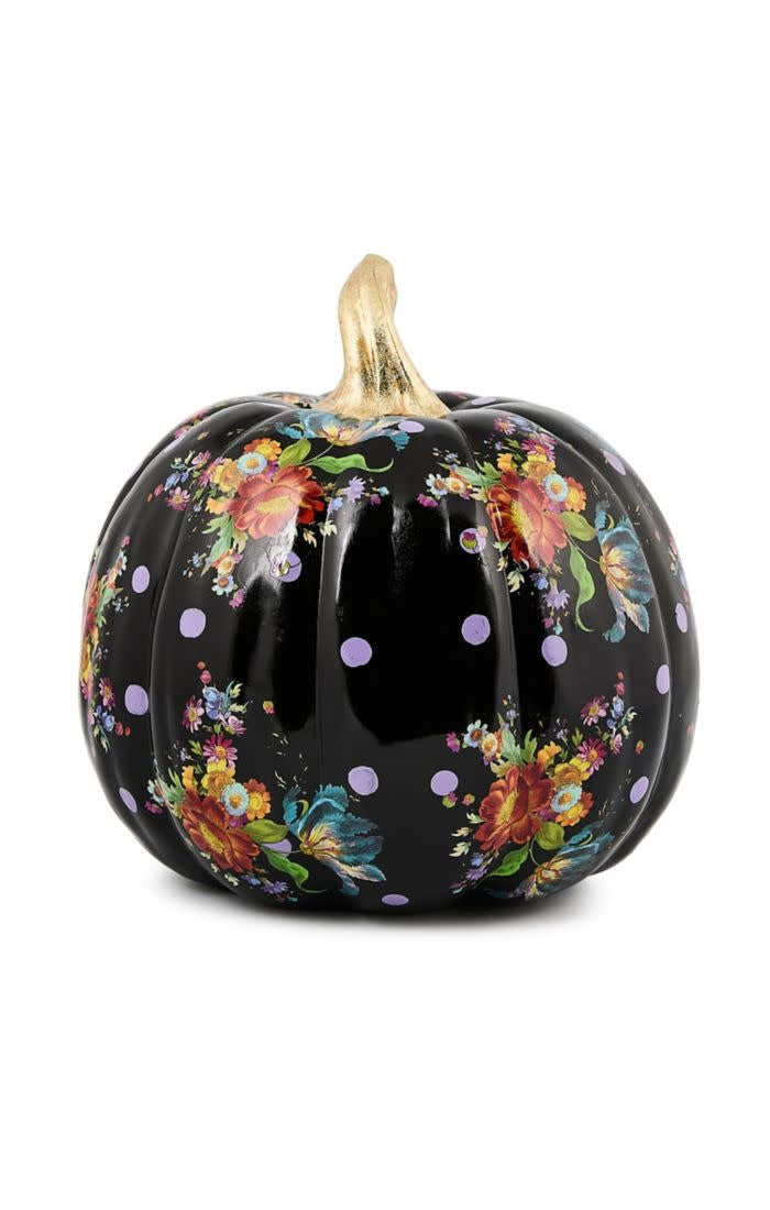 Black resin pumpkin with vibrant floral patterns on an oval silhouette