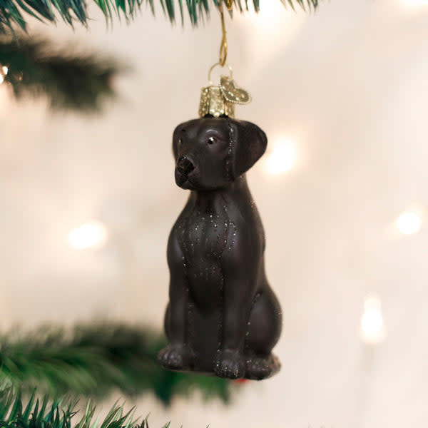 Black Labrador dog ornament with a glossy finish in solid black color.