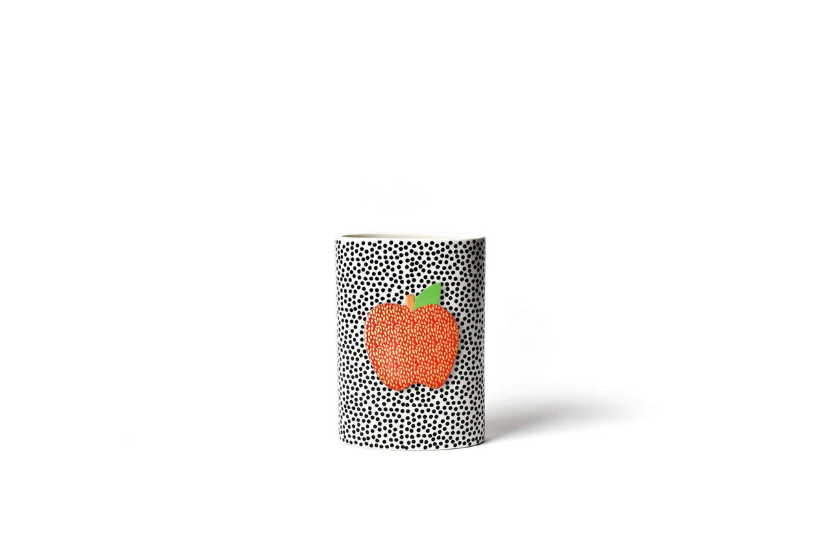 Black ceramic mini oval vase with small dot pattern on smooth surface.
