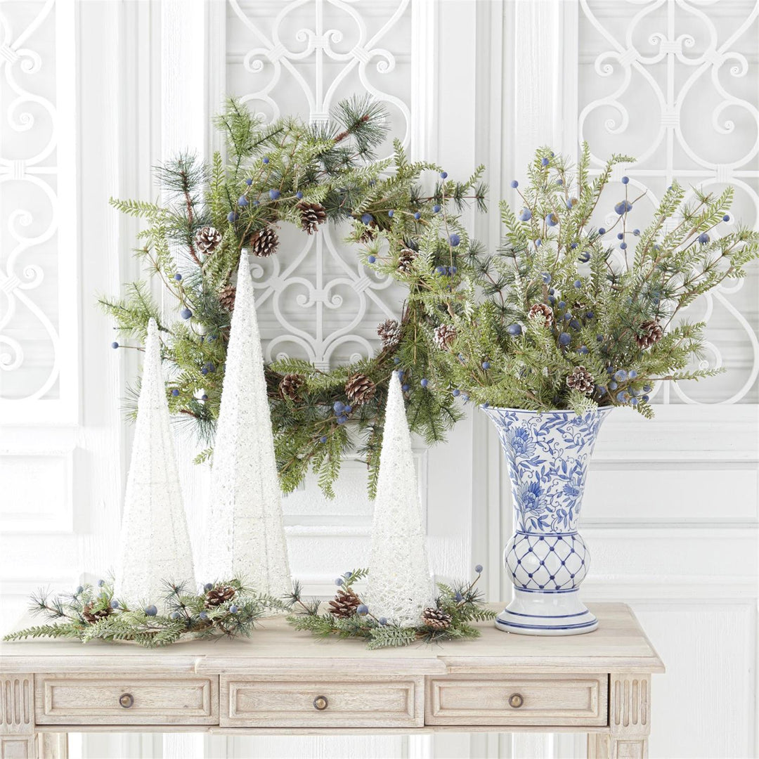 Blue and white fluted ceramic chinoiserie vase with a classic cylindrical silhouette.