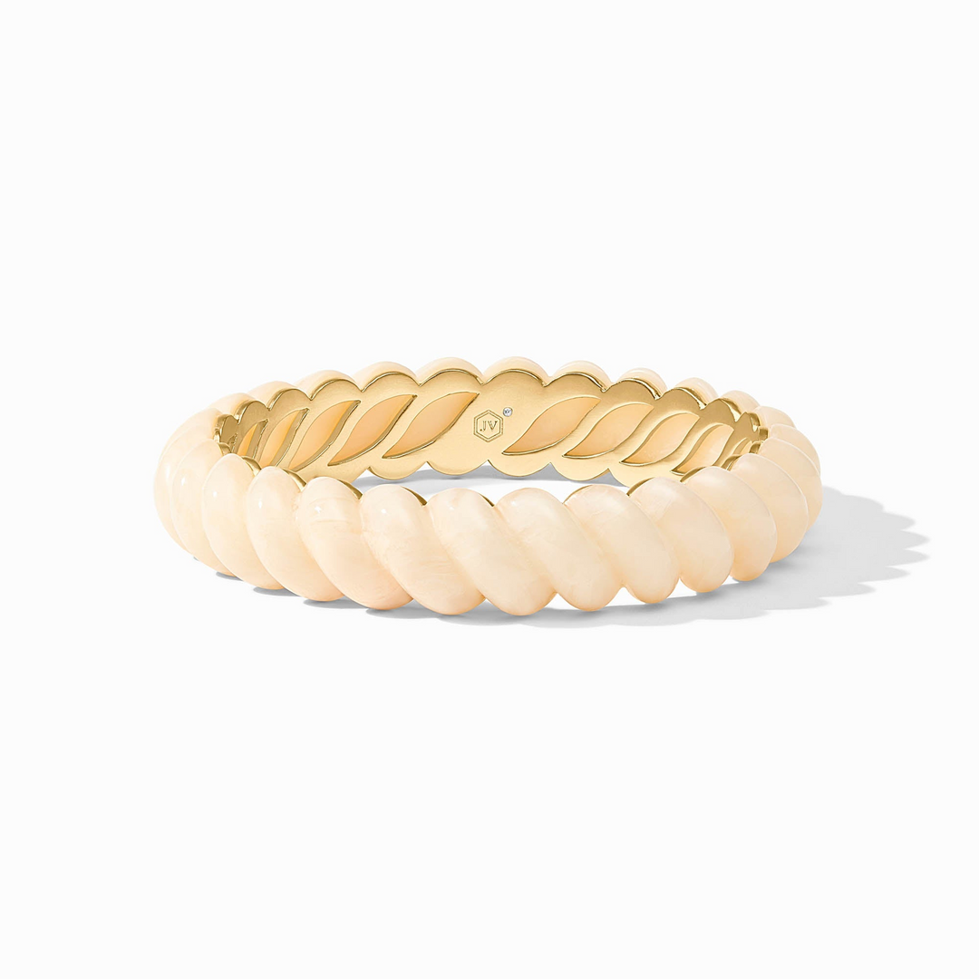 Ravello Statement Bangle in 24K gold plate and cream resin with a twisted rope design.