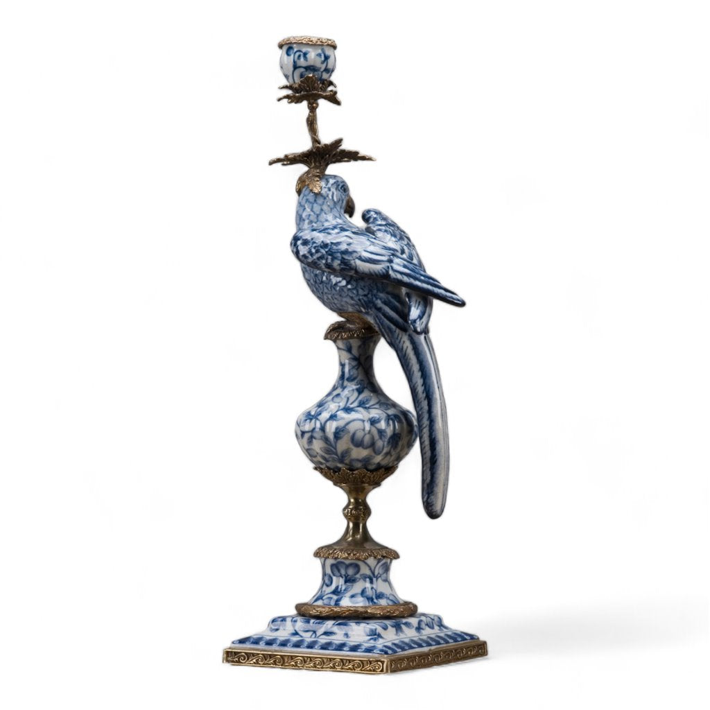 Blue and white porcelain parrot candle holder with ornate bronze ormolu mounts on a square base.