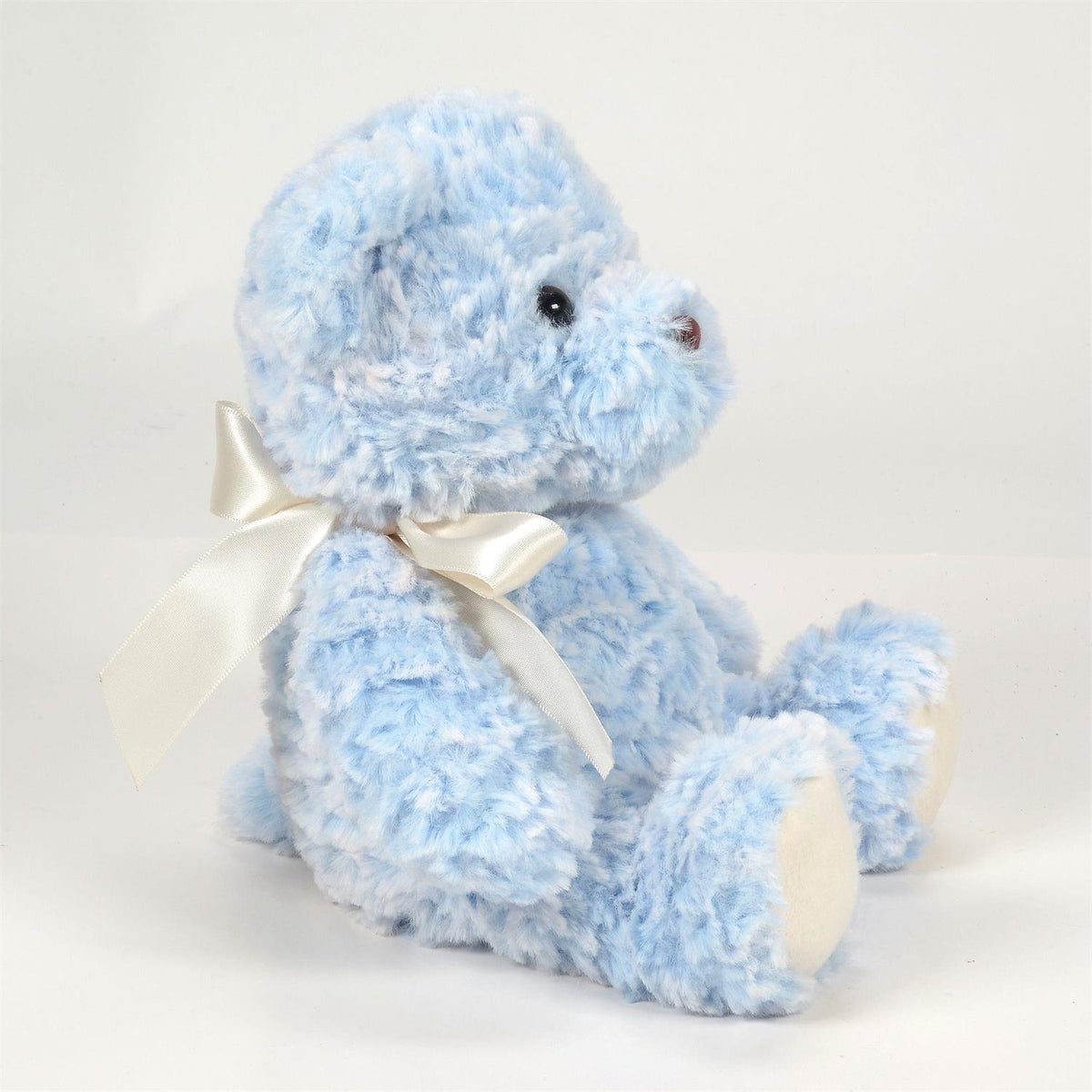 7-inch Lil' Sugarplum teddy bear with silky smooth fabric, weighted microbeads, and soft virgin stuffing in a classic silhouette.