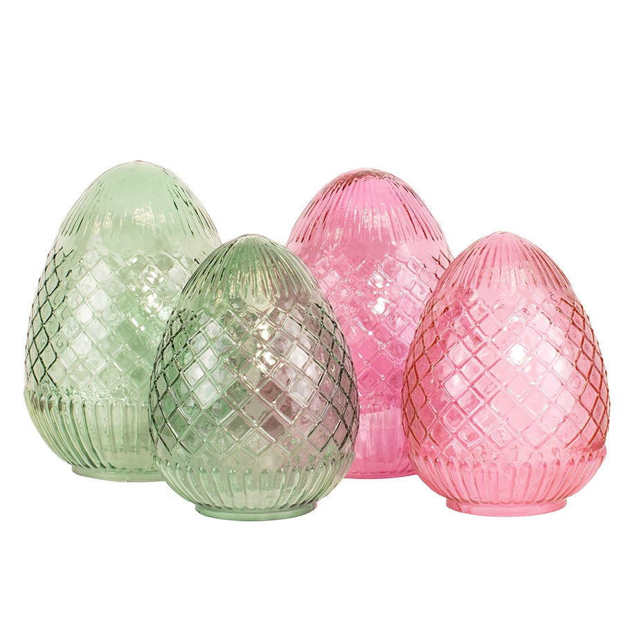 Handcrafted Annalise glass egg with vivid hue and intricate surface details.