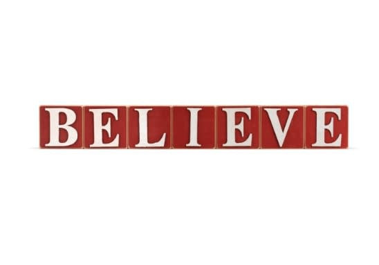 Three wooden composite blocks with red vintage-inspired finish displaying the word Believe.