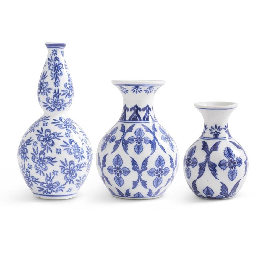Blue and white porcelain bud vase with a classic cylindrical shape.