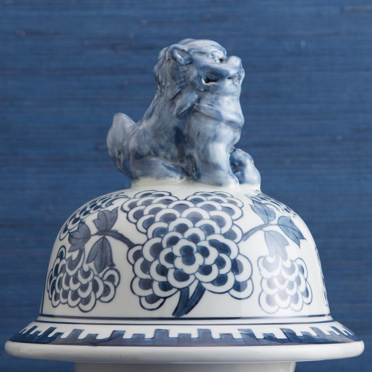 Hand-painted blue and white porcelain temple jar featuring traditional Chinese peony flower designs.