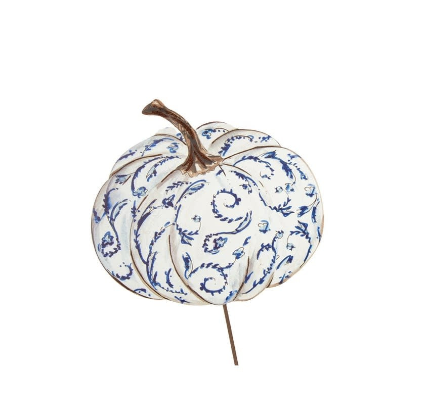 Blue mandala pumpkin with white accents on a natural wood stake.