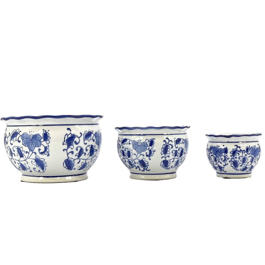Round ceramic plant pot with blue and white floral pattern, ruffled lip edge