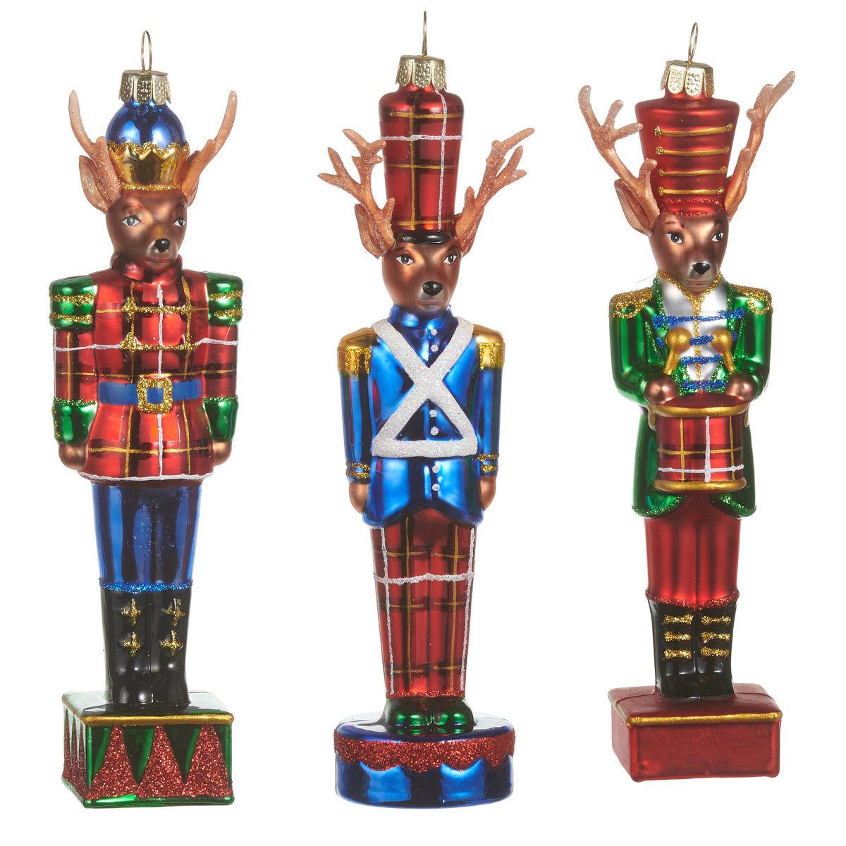 Three assorted 6.5-inch glass deer nutcracker ornaments in festive red, blue, and green outfits.