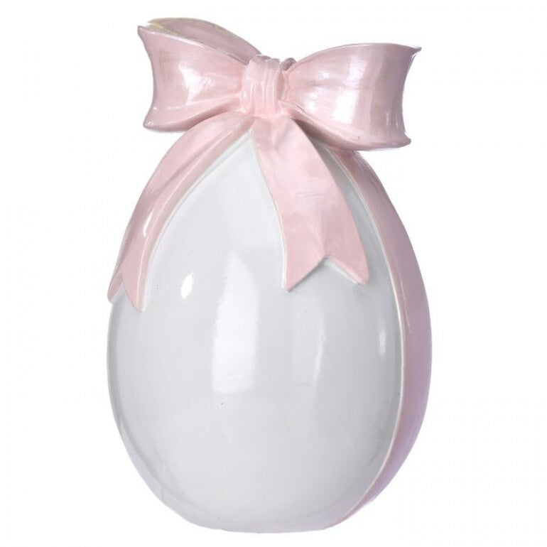Hand-painted resin egg with a delicate bowtie accent in glossy finish.